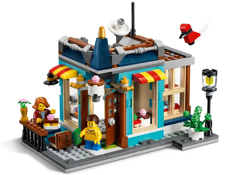 LEGO Creator 31105 Townhouse Toy Store Cake Shop Florist Building Set, 554 Pcs