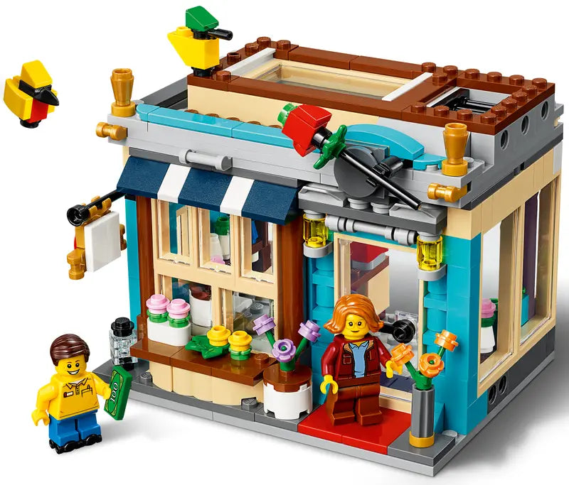 LEGO Creator 31105 Townhouse Toy Store Cake Shop Florist Building Set, 554 Pcs